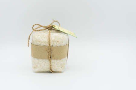 Rice wrapped gifts on a white background in isolate.