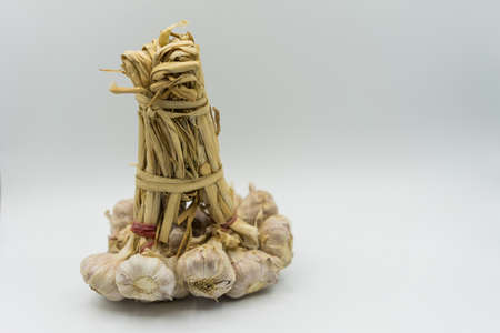 Place the garlic on a white background on isolate.の写真素材
