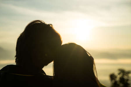 Couples sat resting in the morning sunshine.
