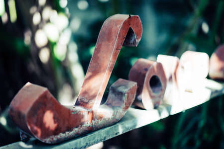 The word love in the shadow of the trees in the coffee shop at morning.の写真素材