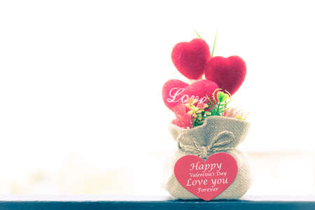 Valentine's Day heart-shaped gift in a bag on the balcony at morning.の写真素材
