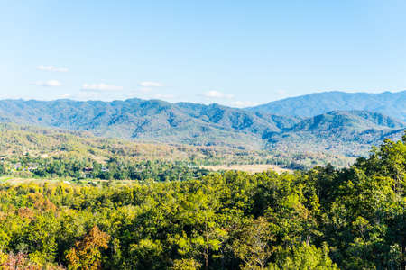View green forests on mountains and sky in sunshine day.の写真素材