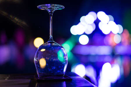 Empty wine glasses on the table at a party and alone.の写真素材