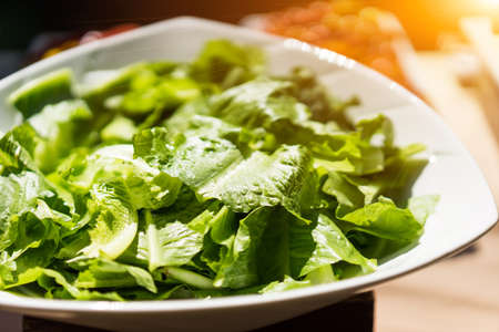 Green vegetables in a white bowl in breakfast.の写真素材