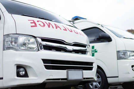 Two Ambulance with patient care in the hospital.の写真素材