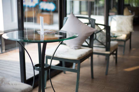 glass table in the empty cafe in the morning waiting for the first customer come.の写真素材