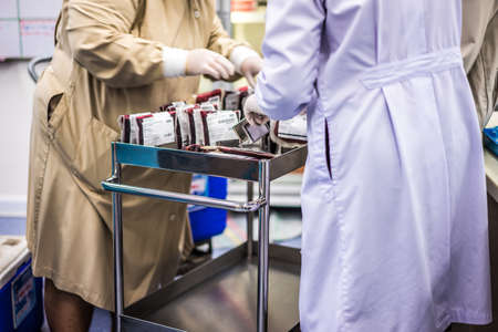 Blood in the blood bank that is being collected by a team of expert doctors.の写真素材