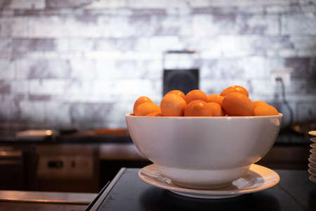Fresh eggs in a cup on the breakfast table in a luxury hotelの写真素材