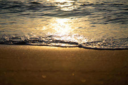 the sea, the beach in the evening when the sun goes down.