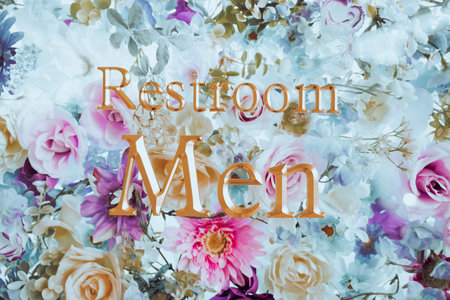 Men's toilet sign background decorated with colorful flowers in vintage tones.の写真素材