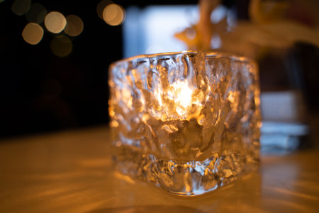 glass with candlelight Romance for a very special night.の写真素材