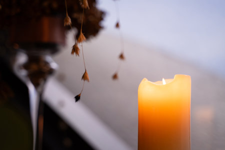 The candle light shines a little flame. spa shop background.の写真素材