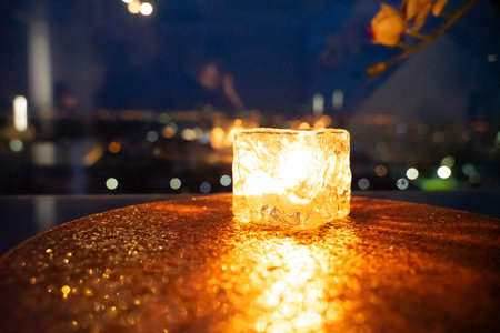 glass with candlelight Romance for a very special night.