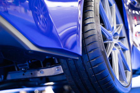 Details about the wheels of a blue super sports car, luxury car.