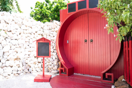 Contemporary design Chinese style red circular wooden door.の写真素材