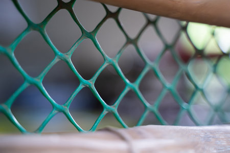 Close-up photo of steel grid barrier, barrier fence.