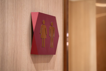 symbol icon male and female bathroom icons wooden wall background.の写真素材