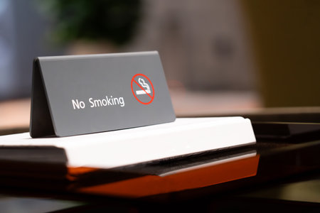 No smoking sign on table in hotel room.の写真素材