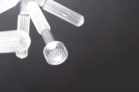 Chandeliers, ceiling lights on a black background.の写真素材