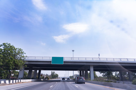 Green blank sign on highway road , space for text ,Road traffic travel concept.