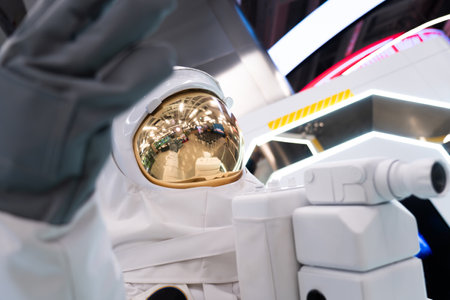 Close-up of astronaut in white spacesuit, blurred background.の写真素材