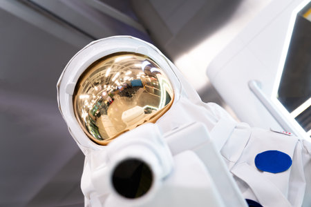 Close-up of astronaut in white spacesuit, blurred background.の写真素材