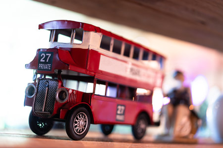 Classic model cars or toy cars. Collection of small buses on shelves. Toy cars with retro design on...