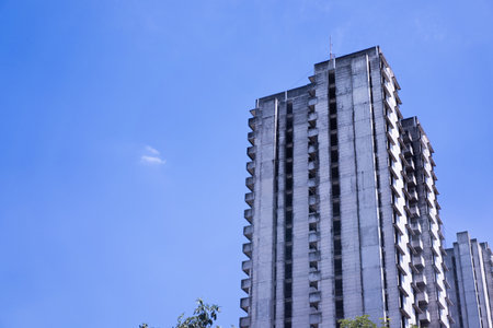 Old skyscrapers against a bright morning sky background.の写真素材