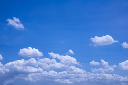 Sky background with white clouds on a clear day.の写真素材