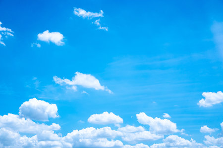Sky background with white clouds on a clear day.の写真素材