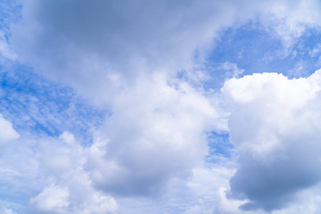 The sky background has dense white clouds on a bright day. Beautiful sky.の写真素材