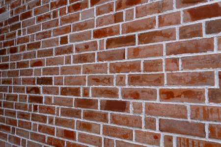 Close-up of a red brick wall background of a cafe.の写真素材