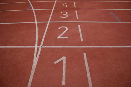 Running tracks on an athletic stadium, with numbers