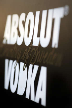 Bucharest, Romania - June 25, 2011: Close-up shot of an ad for Absolut Vodka. Absolut Vodka is a brand of vodka, produced near Ahus, Skane, in southern Sweden.のeditorial素材