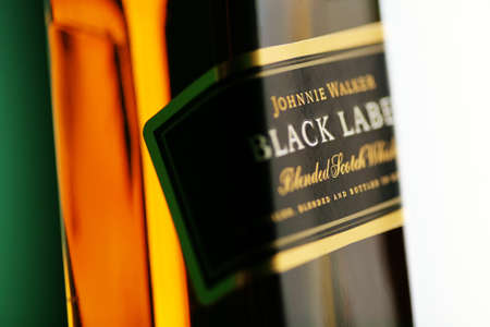 Bucharest, Romania - July 15, 2011: Close-up shot of a bottle of Johnnie Walker whiskey. Johnnie Walker is a brand of Scotch Whisky owned by Diageo and originated in Kilmarnock, Ayrshire, Scotland.のeditorial素材