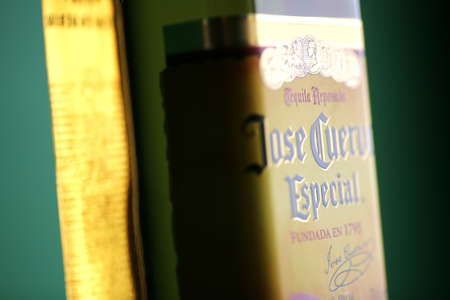 Bucharest, Romania - July 15, 2011: Close-up shot of a bottle of Jose Cuervo tequila. Josï¿½ Cuervo is a brand of tequila produced by Tequila Cuervo La Rojeï¿½a and it has the highest sales of any tequila brand in the world.のeditorial素材