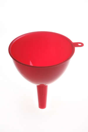 Studio shot of a red funnel isolated on whiteの写真素材