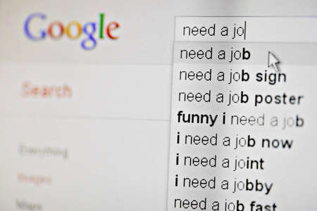 Bucharest, Romania - January 10, 2012. Shot of suggestions made by Google search engine on a "need a job" search, on a computer monitor.のeditorial素材