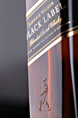 Bucharest, Romania - April 17, 2012: Close-up shot of a bottle of Johnnie Walker whiskey. Johnnie Walker is a brand of Scotch Whisky owned by Diageo and originated in Kilmarnock, Ayrshire, Scotland.のeditorial素材