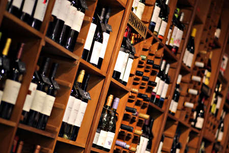 Bucharest, Romania - May 31, 2012: Wine bottles are displayed on shelves in a store in Bucharest, Romania. のeditorial素材