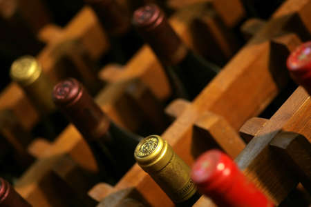 Bucharest, Romania - May 31, 2012: Wine bottles are displayed on shelves in a store in Bucharest,...