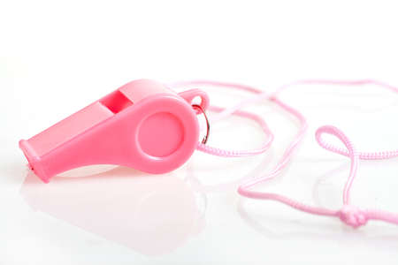 Pink whistle blower on a white background  の写真素材