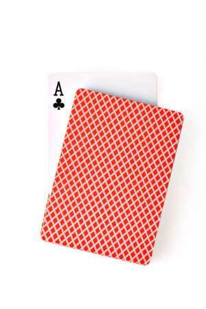 An ace of clubs card is seen from a pile of poker cardsのeditorial素材