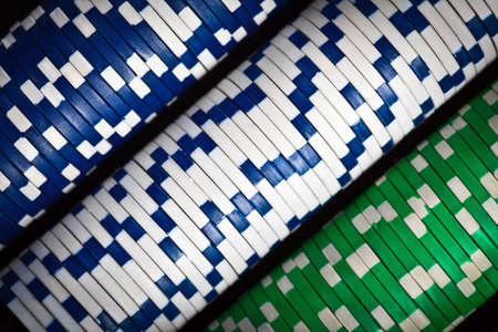 Color shot of a stack of various poker chipsの写真素材