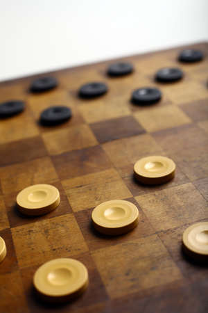 Color shot of a vintage draughts or checkers board game.