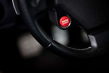 Color detail of a start button in a car