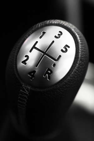 Detail on a gear stick in a new carの写真素材