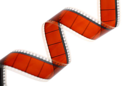 Detail of a red movie film isolated on whiteの写真素材