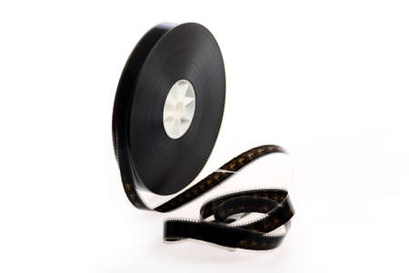 A black film reel isolated on white