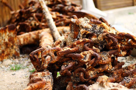 Color detail of some large rusty chainの写真素材